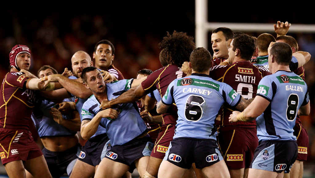 Blues and Maroons players square off during game one of the State of Origin series between the Queensland Maroons and the New South Wales Blues at Etihad Stadium in Melbourne last night. Blues and Maroons players square off during game one of the State of Origin series between the Queensland Maroons and the New South Wales Blues at Etihad Stadium in Melbourne last night.